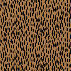 Abstract animal skin seamless repeat pattern with oblong black shapes, spots, brush marks on a light brown background