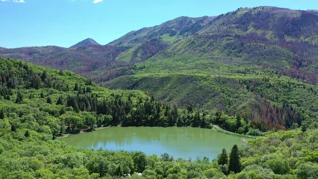 Aerial shot Maple Lake on Nebo Loop up Payson Canyon above Utah Valley mountains