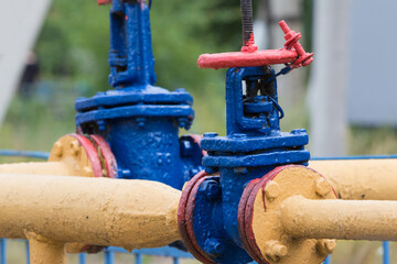 Gas flanged valve with pipe in nature.