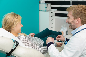 portrait of doctor taking a blood sample