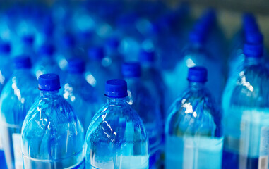 Lots of mineral water bottles.