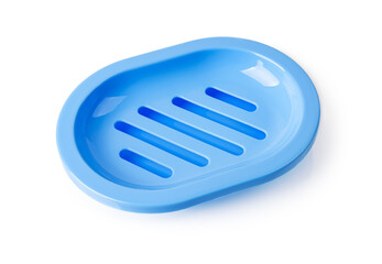 Empty blue soap dish isolated on a white background. New rounded soap holder with drain for bathroom and shower. Washing hands with soap, hygiene, purity and toiletries concepts.
