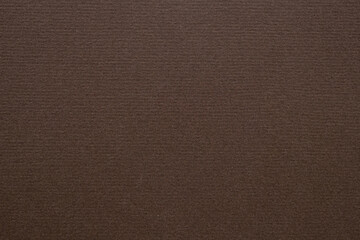 A dense industrial sheet of paper with a textured surface