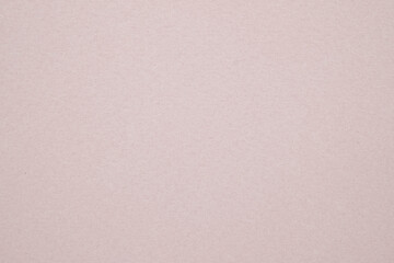 A dense industrial sheet of paper with a textured surface