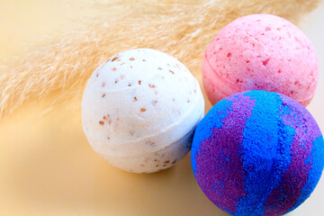bath bomb on colorful background. Spa set, body care, background.