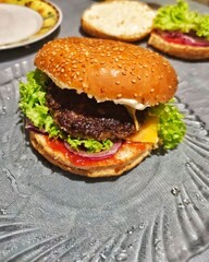 In the photo, a handmade hamburger