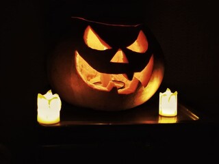 Pictured is a pumpkin with a scary muzzle for Halloween