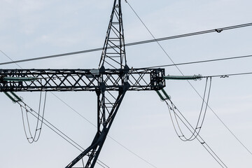 Powerline, electrical towers of high tension for the distribution of electricity. The concept of rising electricity prices. price of electricity