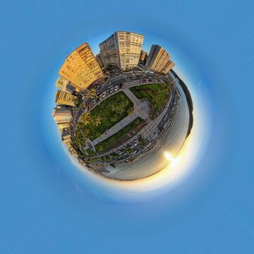 Santos city beach, Brazil. 360 degree sphere. Circular, stereographic and polar panorama of the Ponta da Praia region at sunset.