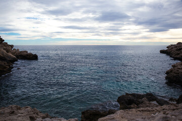 a beautiful coastline, beach, coves and cliffs in Villajoyosa, Alicante, Spain. Walking for the mountain route.