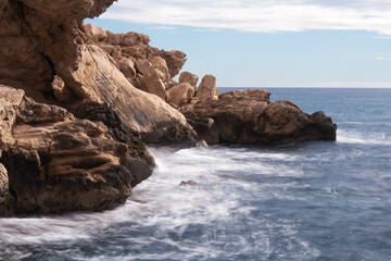 technical photography with long exposure, coves and cliffs. Villajoyosa, Alicante, Spain.