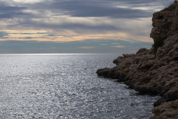a beautiful coastline, beach, coves and cliffs in Villajoyosa, Alicante, Spain. Walking for the mountain route.