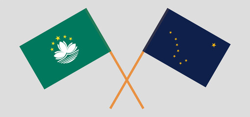 Crossed flags of Macau and the State of Alaska. Official colors. Correct proportion