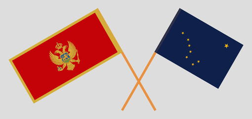 Crossed flags of Montenegro and the State of Alaska. Official colors. Correct proportion