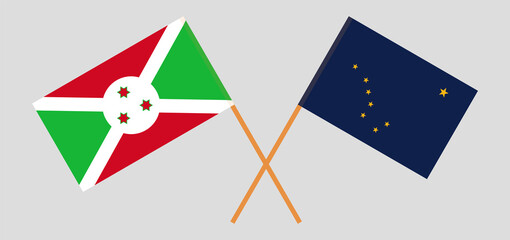 Crossed flags of Burundi and the State of Alaska. Official colors. Correct proportion