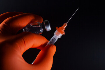 Covid-19 vaccine and Disposable syringe	