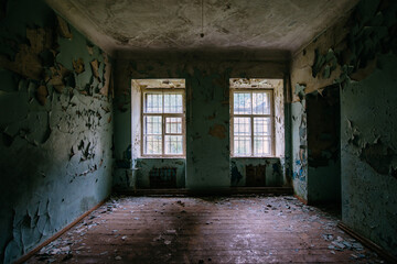 Fototapeta na wymiar Inside old Asylum for the insane. Dark creepy abandoned mental hospital