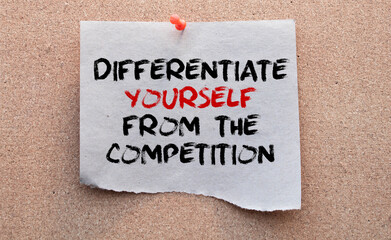 Handwritten text DIFFERENTIATE YOURSELF FROM THE COMPETITION next to yellow lighting bulb.