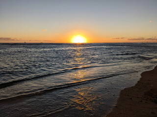 Dramatic Sunset from beach over ocean