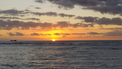 Dramatic Sunset from beach over ocean