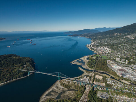 Stock Aerial Photo of The Iconic Lions Gate Bridge and English Bay Vancouver BC  , Canada