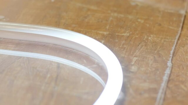 Production of advertising signs with backlit LED strip