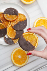 Dark chocolate dipped dry orange slices