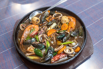 Filipino popular food sizzling mixed seafood