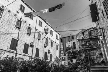 SPLIT, CROATIA, 7 AUGUST 2019: Clothes hanging between old buildings in the historic center