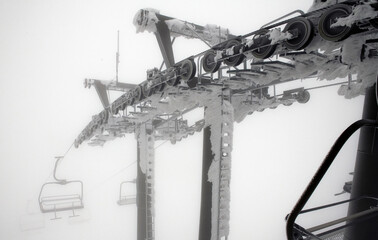 Ski Lift covered in snow. Kasprowy Wierch Chair Lift. Tatra Mountains