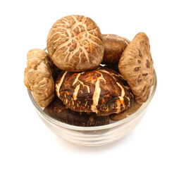 Mushrooms dry in basket on white background