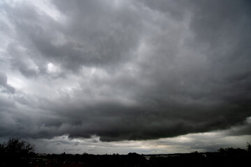 Obraz na płótnie Canvas dark storm clouds with background,Dark clouds before a thunder-storm.