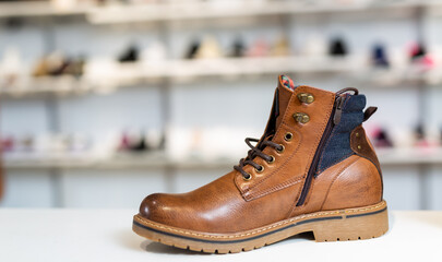 Lots of leather wintry male and female shoes at shop
