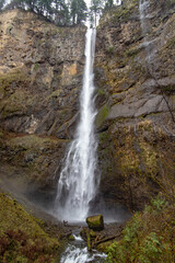 Beautiful Waterfall In Green Scenery Of Oregon