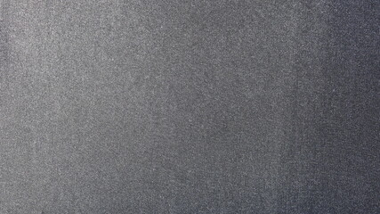 Fototapeta na wymiar Black velvet background. The texture of the black cloth. Close up, selected focus
