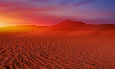 Fototapeta na wymiar Orange ripple sand dune desert at sunset - Namibia, Africa
