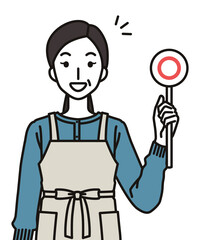 丸のふだを持つ40代・50代の主婦の女性