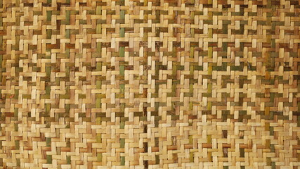 Hand-woven bamboo pattern. Background of handicrafts of bamboo weaving in ancient Thai patterns for furniture materials. Selective focus