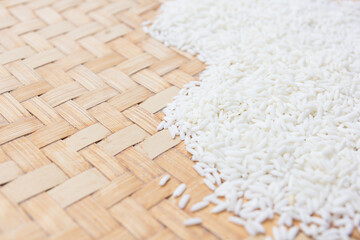 Close up rice grain on wooden basket