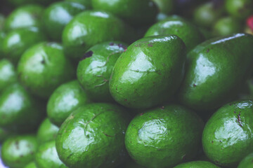 Fresh Avocadoes for sale on market	
