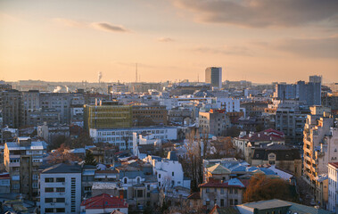 Bucharest from above during a beautiful winter sunset. View to city center, downtown and its most...
