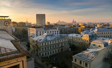 Sunset in Bucharest. View from above over the biggest city in Romania. A lot of its landmarks are...