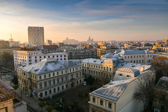 Sunset in Bucharest. View from above over the biggest city in Romania. A lot of its landmarks are in this image.