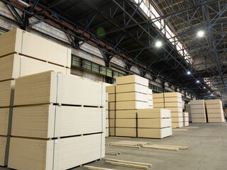 A lumber warehouse located in a stack. Industrial wood