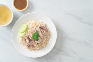 Hainanese Chicken Rice or steamed rice with chicken