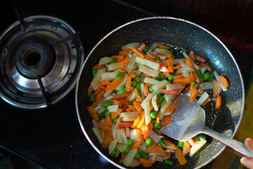 Closeup image special traditional Vegetable curry making with mixed vegetables. Selective focus