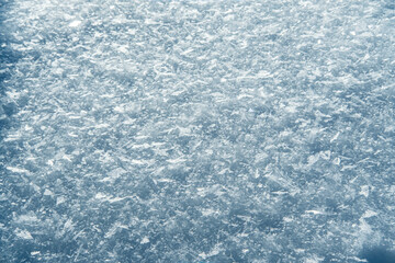 Fresh snow background texture. Winter background with big beautiful snowflakes.