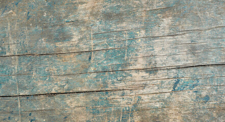 Weathered blue with green and brown wood sheet, Old wooden boards with crack on the plank surface