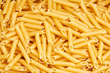 Background of raw macaroni, pasta. Italian food