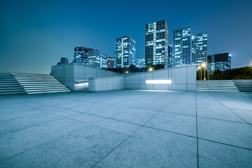 Panoramic skyline and modern commercial office buildings with empty floor in Beijing, China.